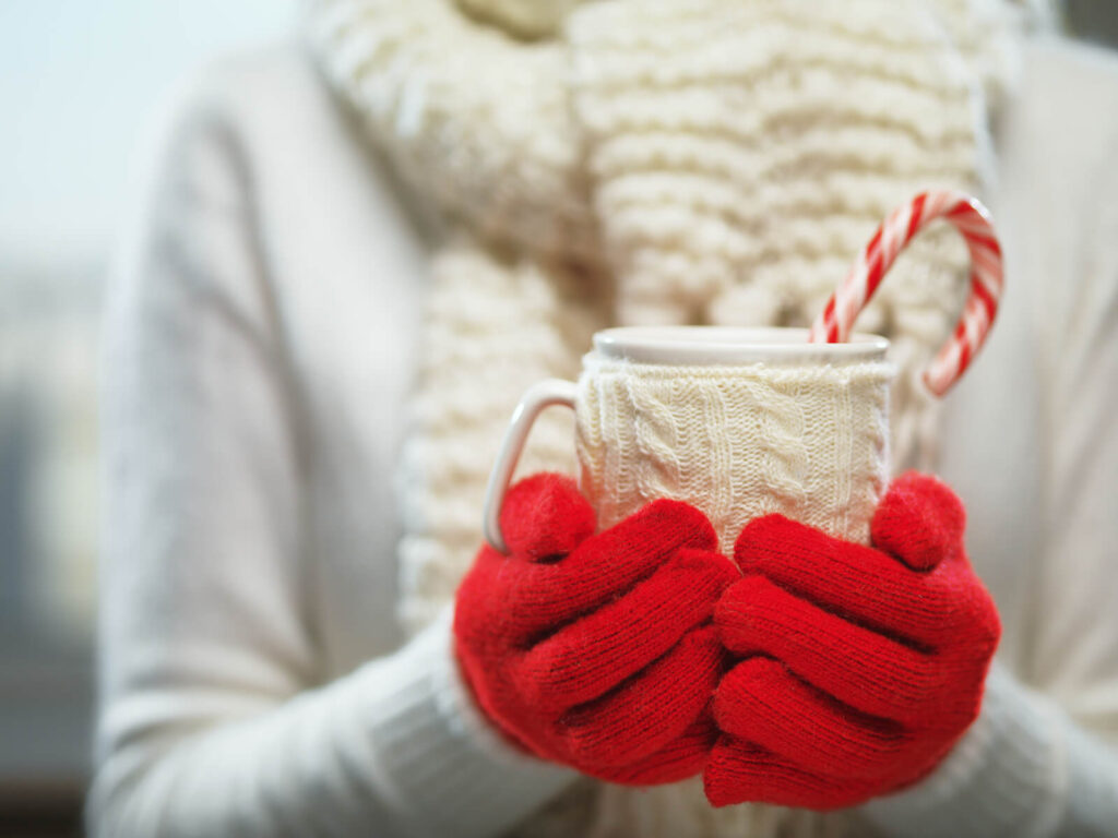Woman holding winter cup
